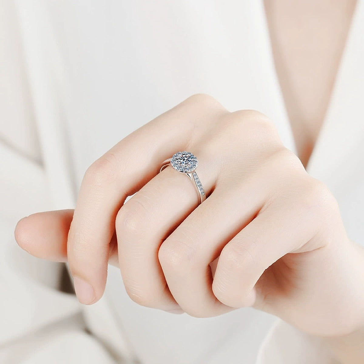 Round Halo Moissanite Ring with CZ in Rhodium-Plated S925 Sterling Silver worn on hand, showing scale, finger coverage, and rhodium-plated finish