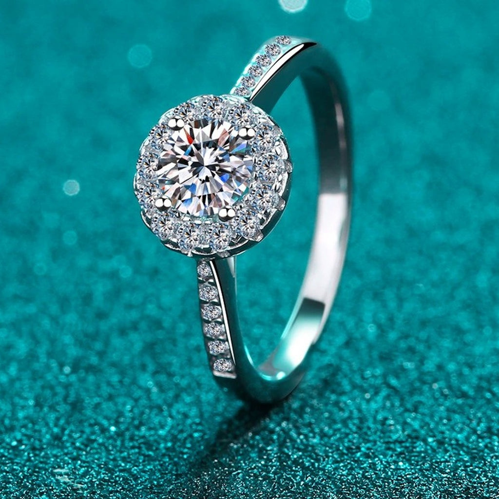 Round Halo Moissanite Ring with CZ in Rhodium-Plated S925 Sterling Silver blue display product photo showing the moissanite setting and band profile