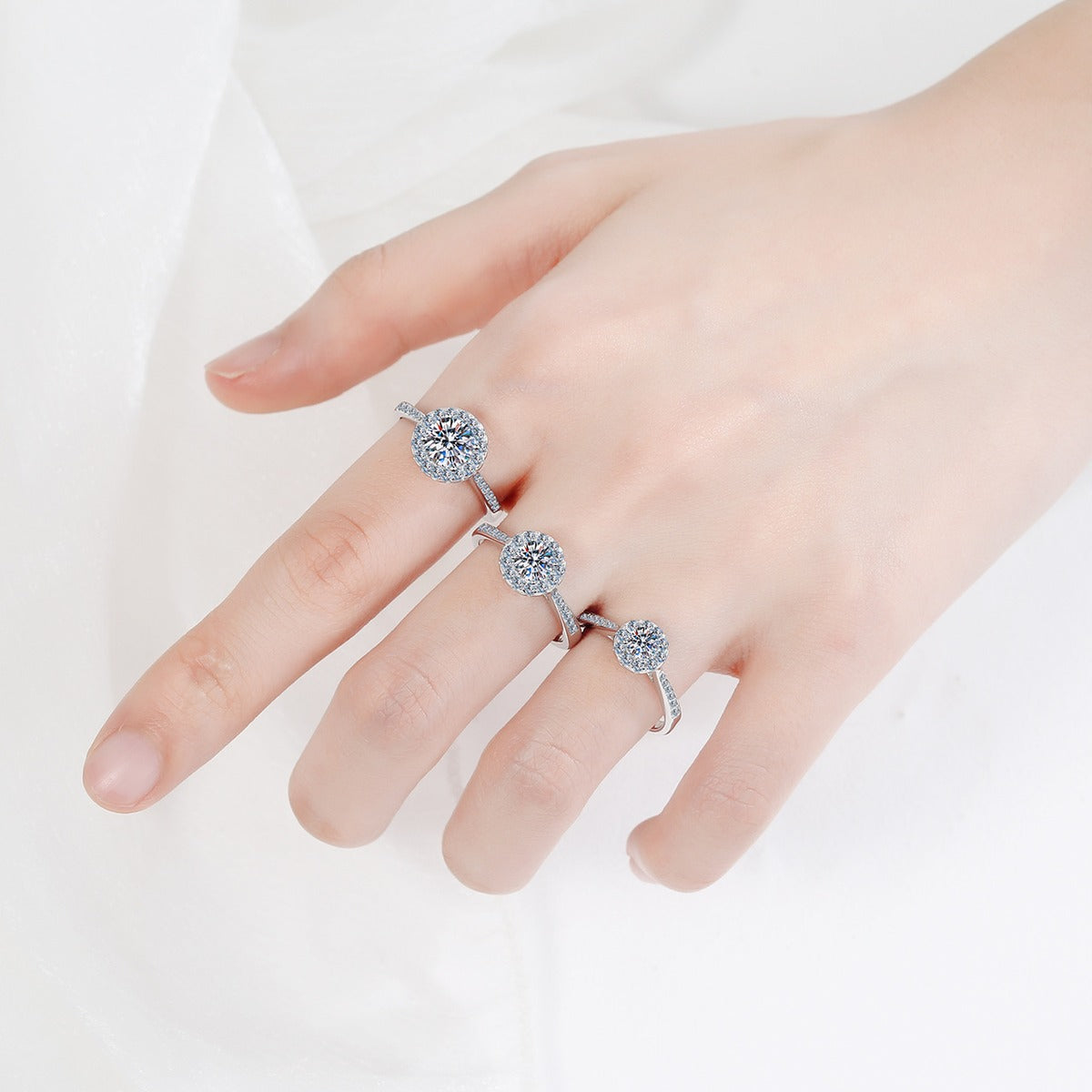 Round Halo Moissanite Ring with CZ in Rhodium-Plated S925 Sterling Silver studio product angle showing the ring setting, stone detail, and band design