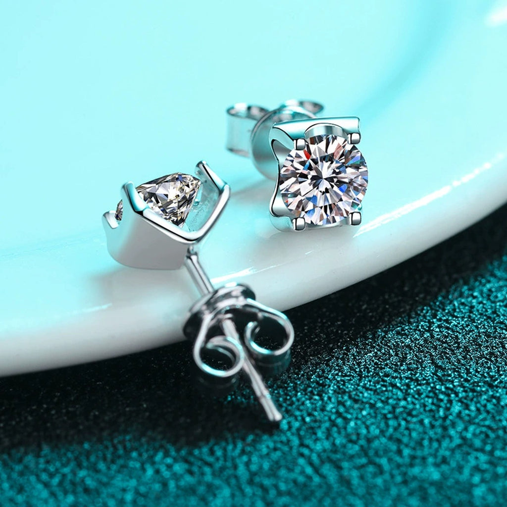 Square Moissanite Stud Earrings with CZ in Rhodium-Plated S925 Sterling Silver on blue-green fabric showing front detail