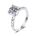 Round Moissanite Twisted Solitaire Ring with CZ in rhodium-plated S925 sterling silver on clean white background