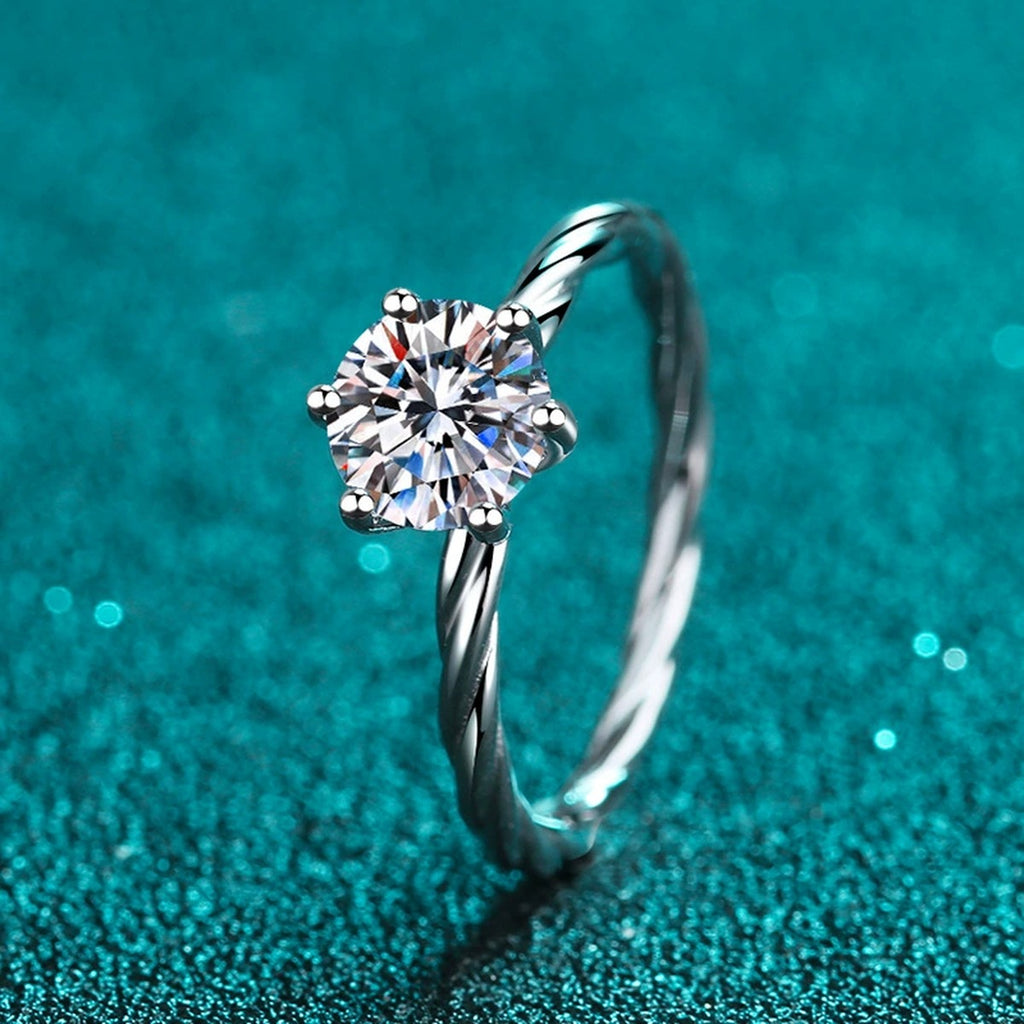 Round Moissanite Ring in Rhodium-Plated S925 Sterling Silver blue display product photo showing the moissanite setting and band profile