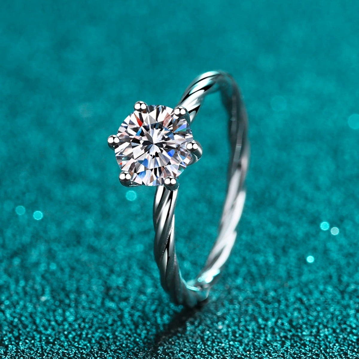 Round Moissanite Ring in Rhodium-Plated S925 Sterling Silver blue display product photo showing the moissanite setting and band profile