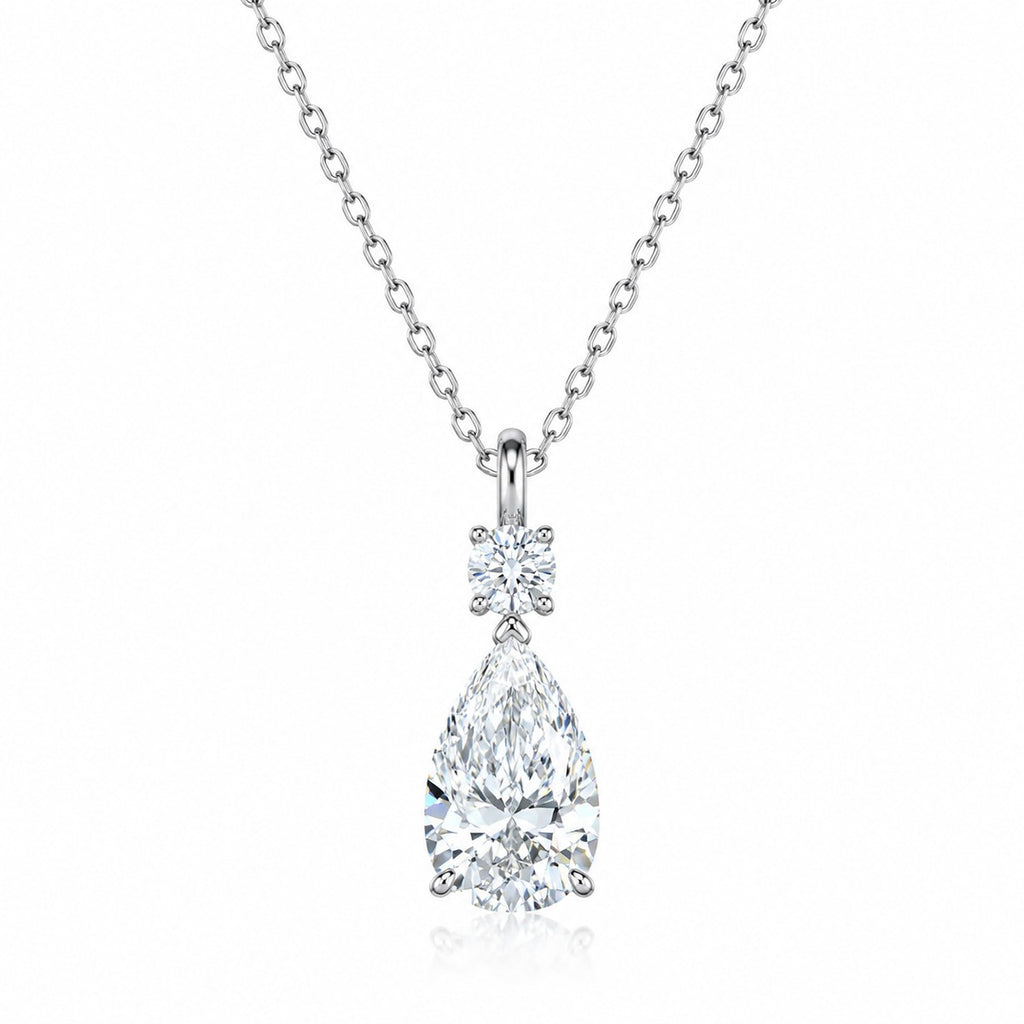 Pear and Round Moissanite Drop Necklace in Rhodium-Plated S925 sterling silver white background product photo showing drop pendant with pear cut and round moissanite stones