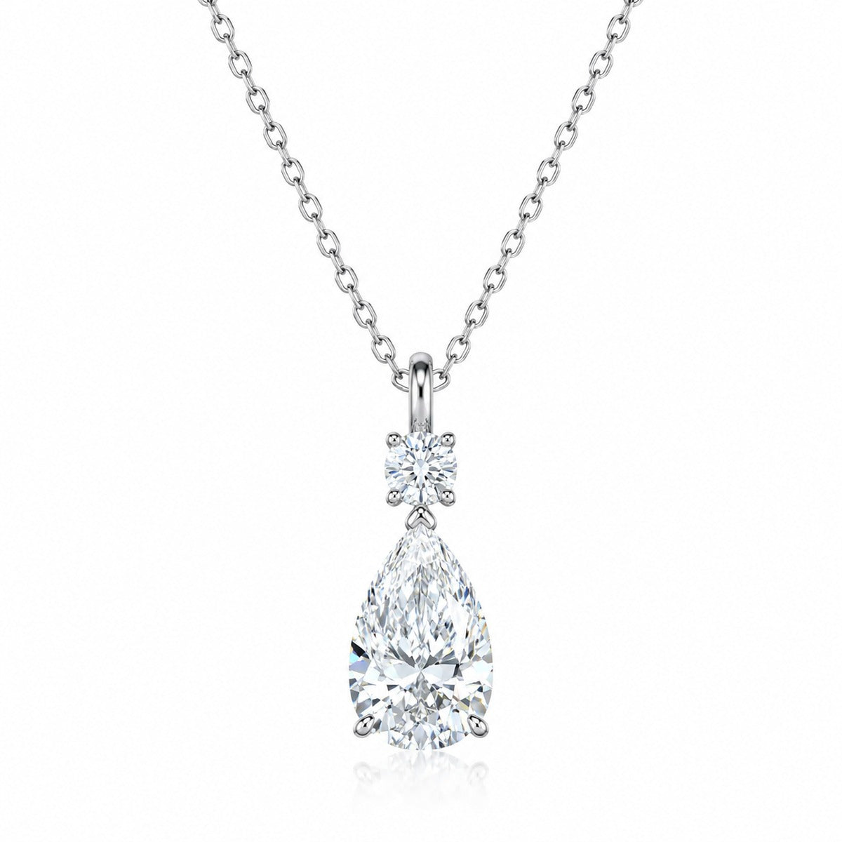 Pear and Round Moissanite Drop Necklace in Rhodium-Plated S925 sterling silver white background product photo showing drop pendant with pear cut and round moissanite stones