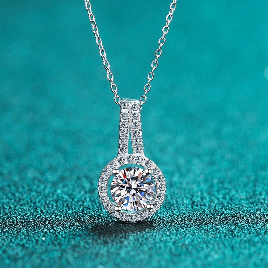 Halo Solitaire Moissanite Pendant Necklace with CZ in Rhodium-Plated S925 sterling silver product scene view showing angled sparkle