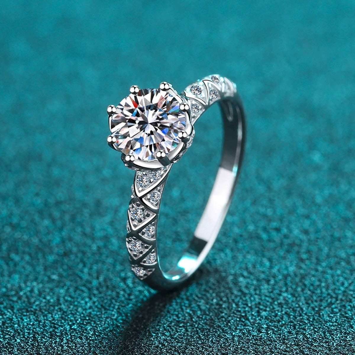 Round Moissanite Side Stone Engagement Ring with CZ product view showing moissanite setting and metal finish