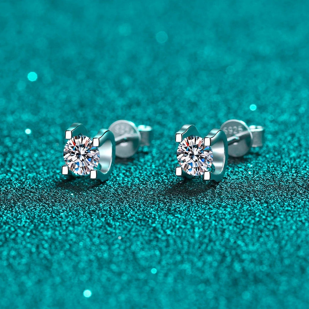 Round Moissanite Stud Earrings in Rhodium-Plated S925 sterling silver product scene view showing angled setting detail