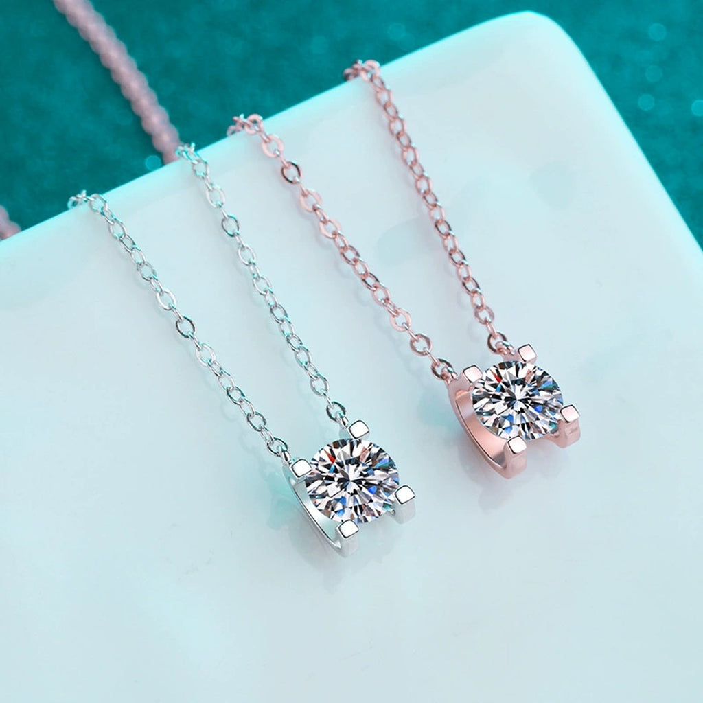 Solitaire Moissanite Pendant Necklace in Rhodium and Rose Gold-Plated S925 sterling silver product scene view showing angled sparkle