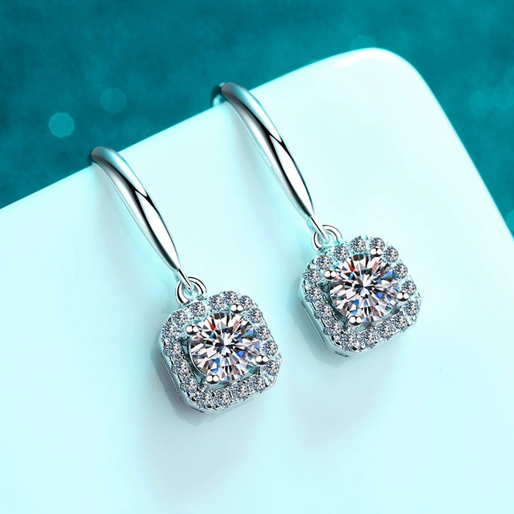 Round Halo Moissanite Hook Dangle Earrings with CZ in Rhodium-Plated S925 sterling silver product scene view showing angled setting detail