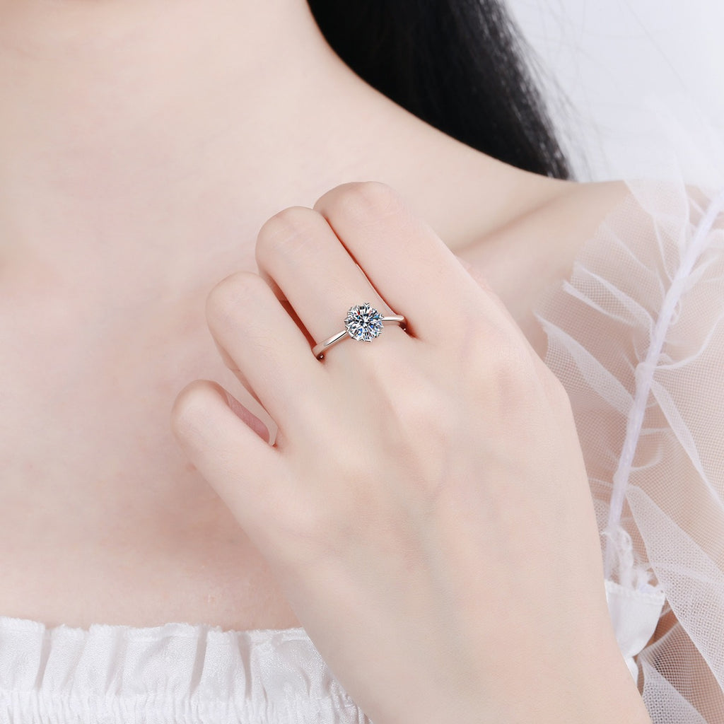 Round Moissanite Adjustable Solitaire Ring worn on hand to show scale, band width, and ring profile