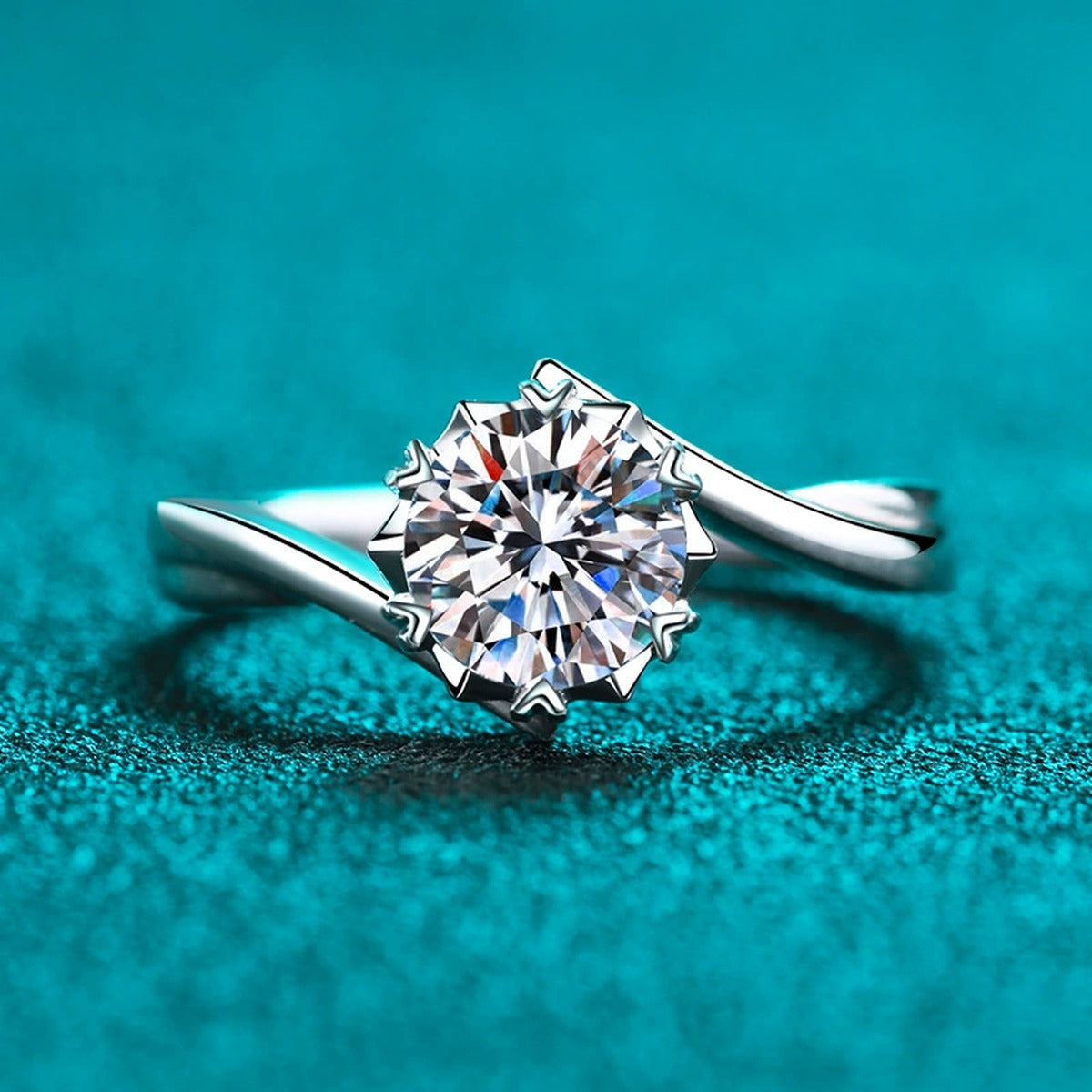 Round Moissanite Solitaire Ring in Rhodium-Plated S925 Sterling Silver blue display product photo showing the moissanite setting and band profile