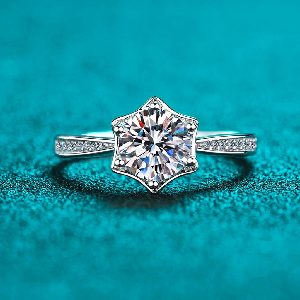 Round Moissanite Ring with CZ in Rhodium-Plated S925 Sterling Silver blue display product photo showing the moissanite setting and band profile