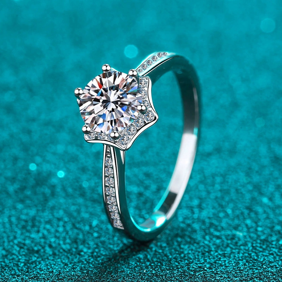 Round Moissanite Ring with CZ in Rhodium-Plated S925 Sterling Silver blue display product photo showing the moissanite setting and band profile