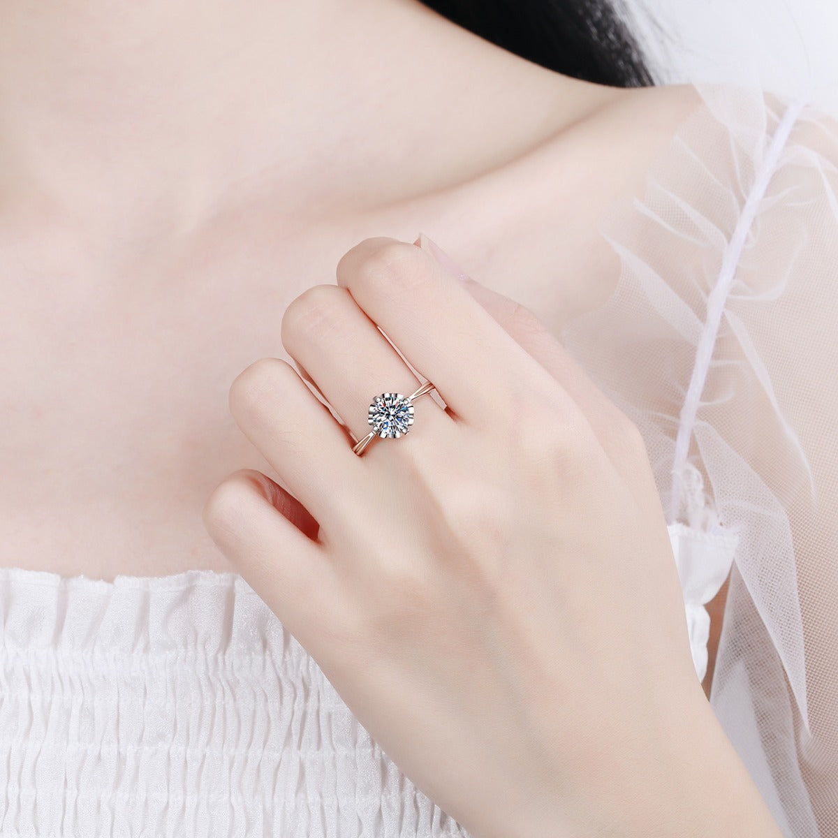 Round Moissanite Solitaire Engagement Ring with CZ worn on hand to show scale, band width, and ring profile