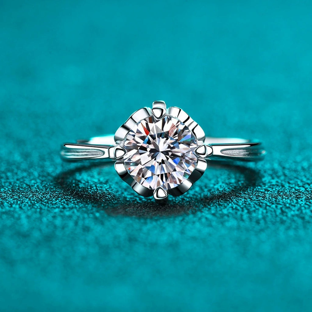 Round Moissanite Solitaire Engagement Ring with CZ product view showing moissanite setting and metal finish