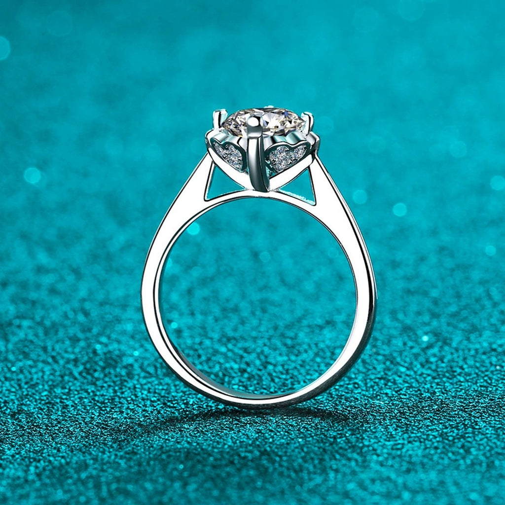 Round Moissanite Solitaire Engagement Ring with CZ product view showing moissanite setting and metal finish