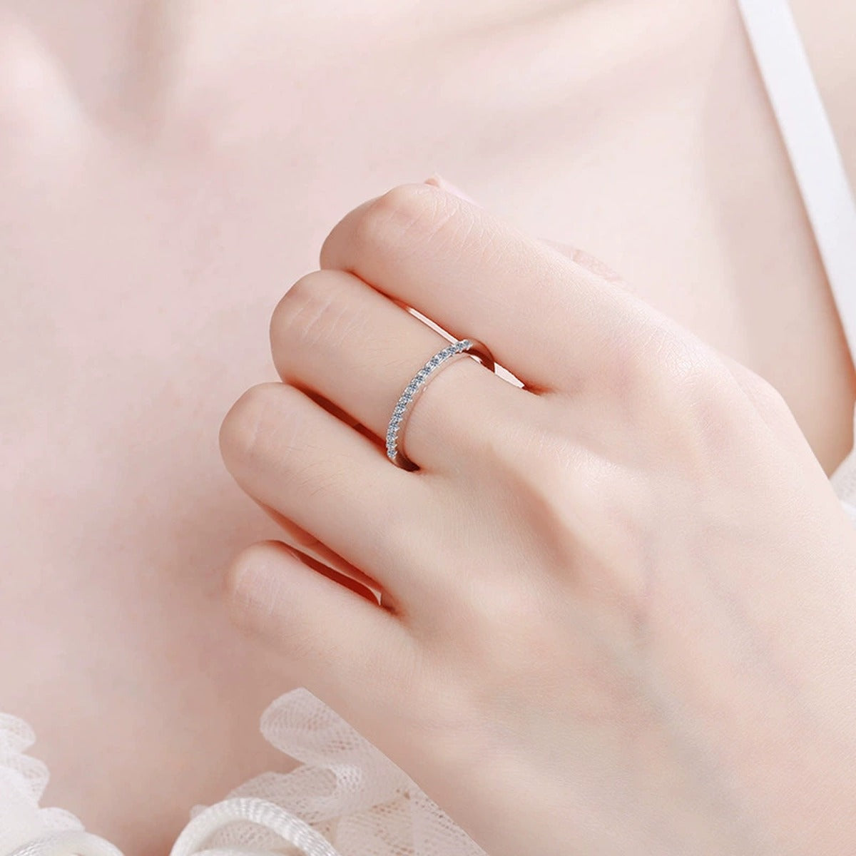 Pave Moissanite Band Ring in Rhodium-Plated S925 Sterling Silver worn on hand, showing scale, finger coverage, and rhodium-plated finish