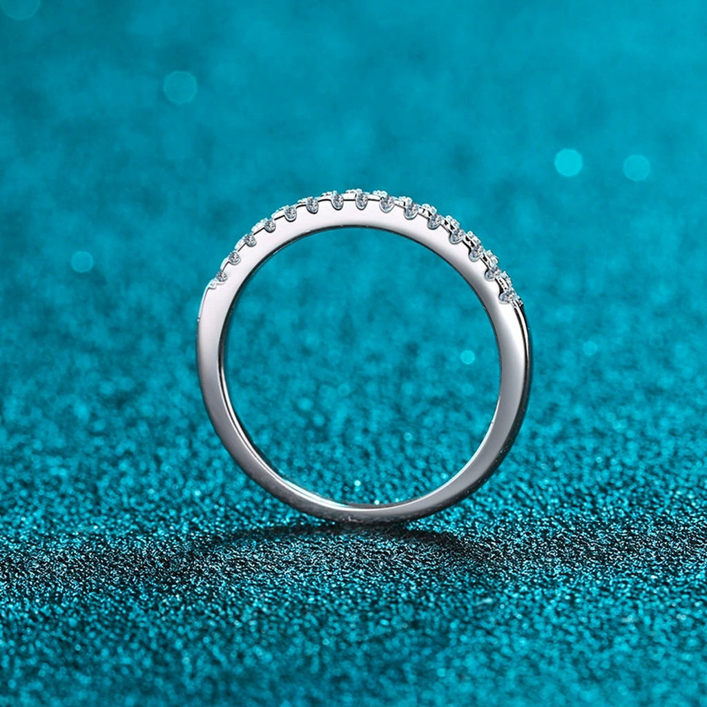 Pave Moissanite Band Ring in Rhodium-Plated S925 Sterling Silver blue display product photo showing the moissanite setting and band profile