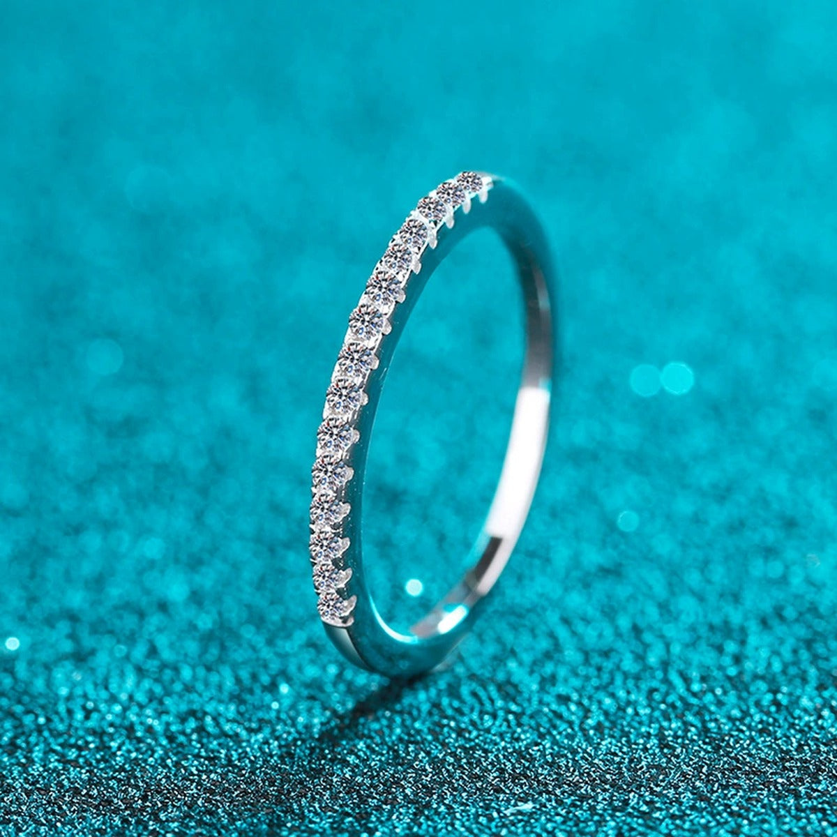 Pave Moissanite Band Ring in Rhodium-Plated S925 Sterling Silver blue display product photo showing the moissanite setting and band profile