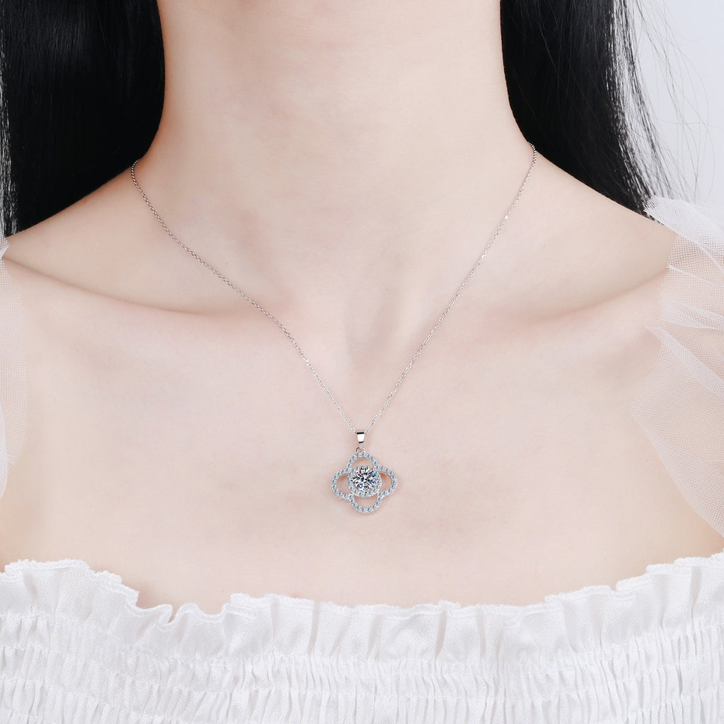Clover Moissanite Pendant Necklace with CZ in Rhodium-Plated S925 sterling silver worn on neckline by model showing scale and adjustable chain styling