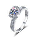 Round Halo Moissanite Ring with CZ in Rhodium-Plated S925 Sterling Silver clean white background product photo showing the ring silhouette and moissanite setting