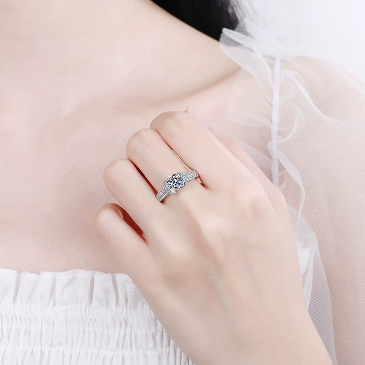 Round Halo Moissanite Ring with CZ in Rhodium-Plated S925 Sterling Silver worn on hand, showing scale, finger coverage, and rhodium-plated finish