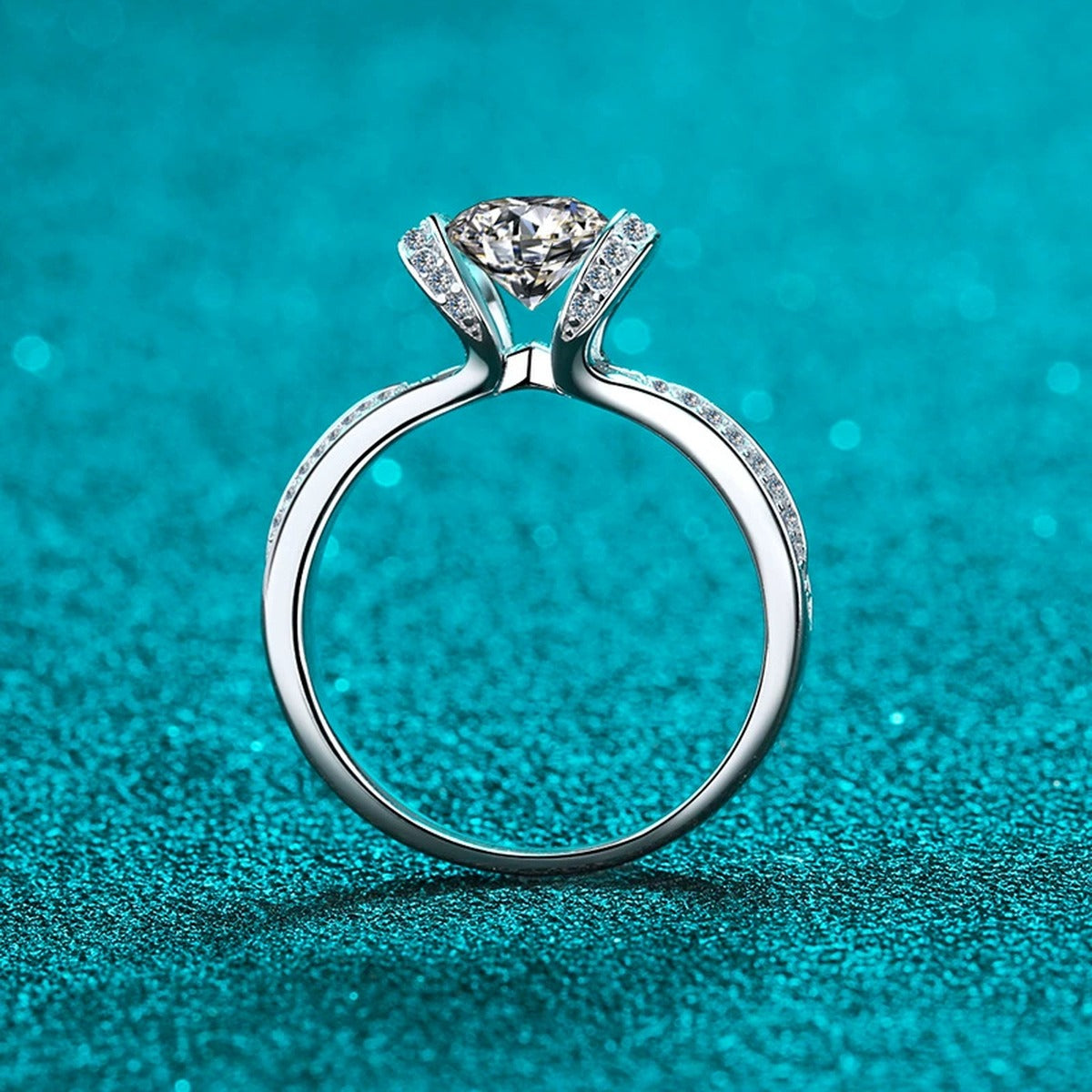 Round Halo Moissanite Ring with CZ in Rhodium-Plated S925 Sterling Silver blue display product photo showing the moissanite setting and band profile