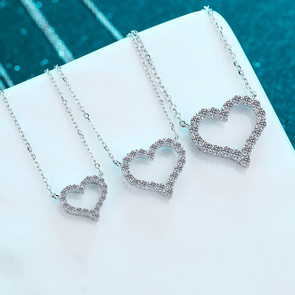 Heart Pave Moissanite Pendant Necklace in Rhodium-Plated S925 sterling silver product scene view showing chain and setting detail