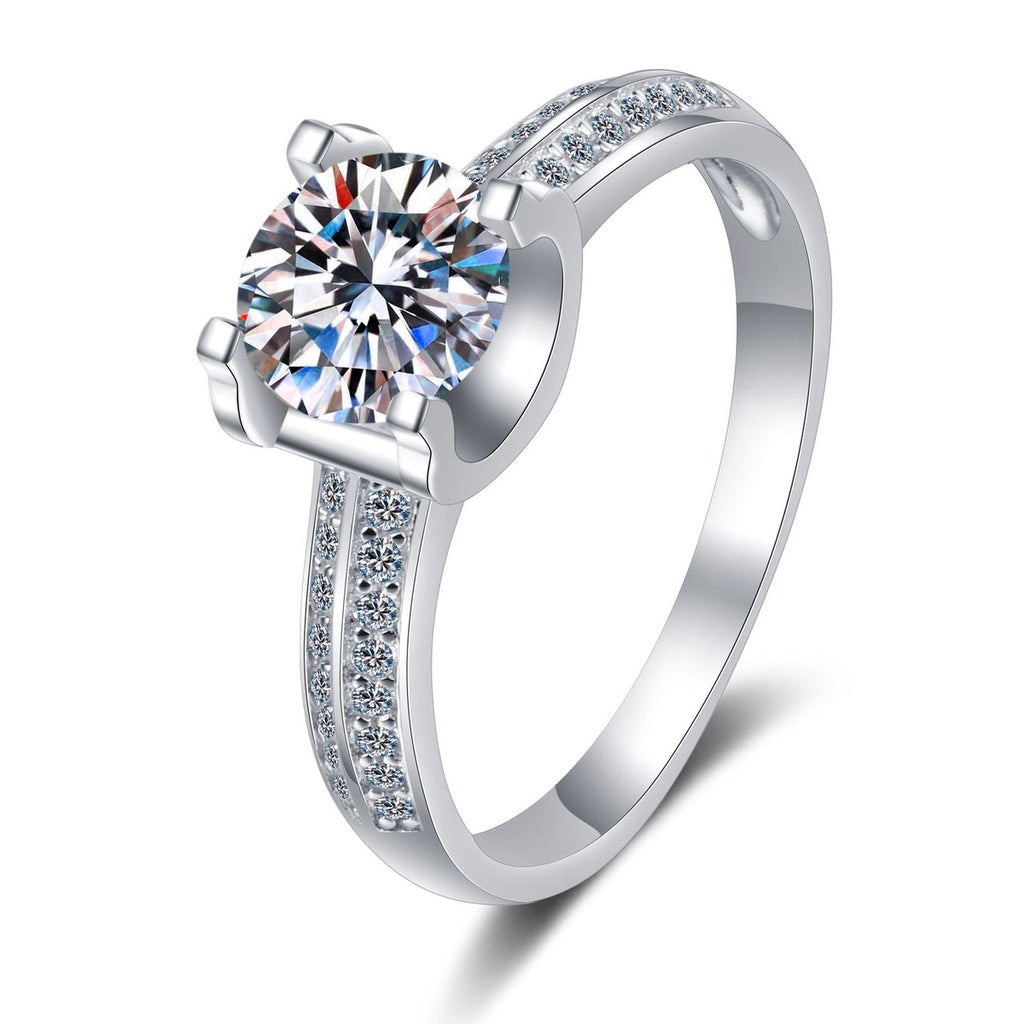 Round Moissanite Side Stone Engagement Ring with CZ in rhodium-plated S925 sterling silver on clean white background