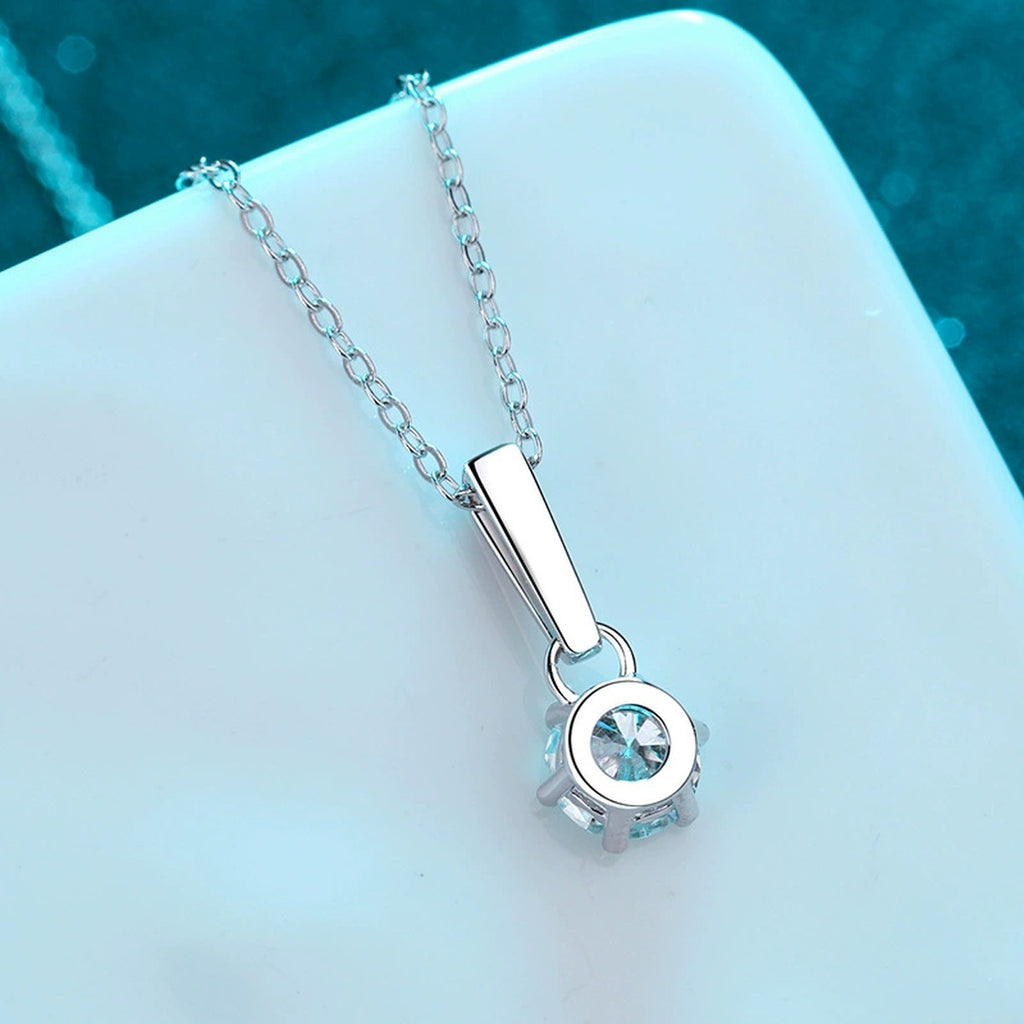 Solitaire Moissanite Pendant Necklace in Rhodium-Plated S925 sterling silver product scene view showing pendant detail
