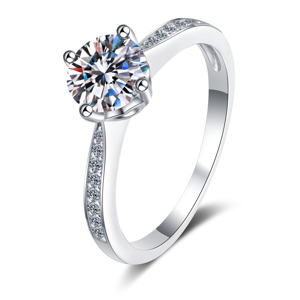 Round Moissanite Side Stone Engagement Ring with CZ in rhodium-plated S925 sterling silver on clean white background