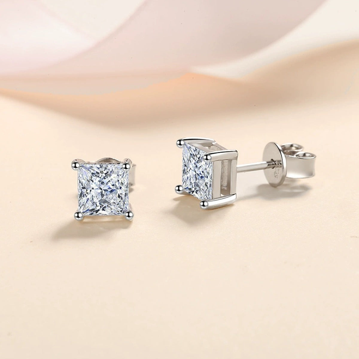 Princess Cut Moissanite Stud Earrings in Rhodium-Plated S925 sterling silver product scene view showing angled setting detail