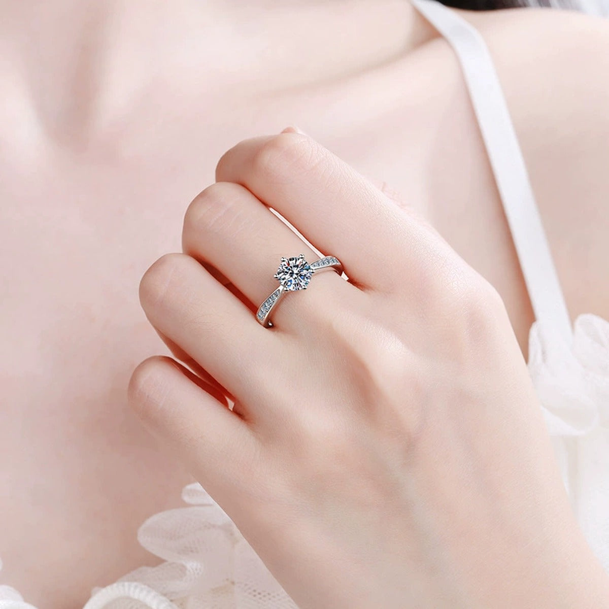 Round Moissanite Side Stone Ring with CZ in Rhodium-Plated S925 Sterling Silver worn on hand, showing scale, finger coverage, and rhodium-plated finish