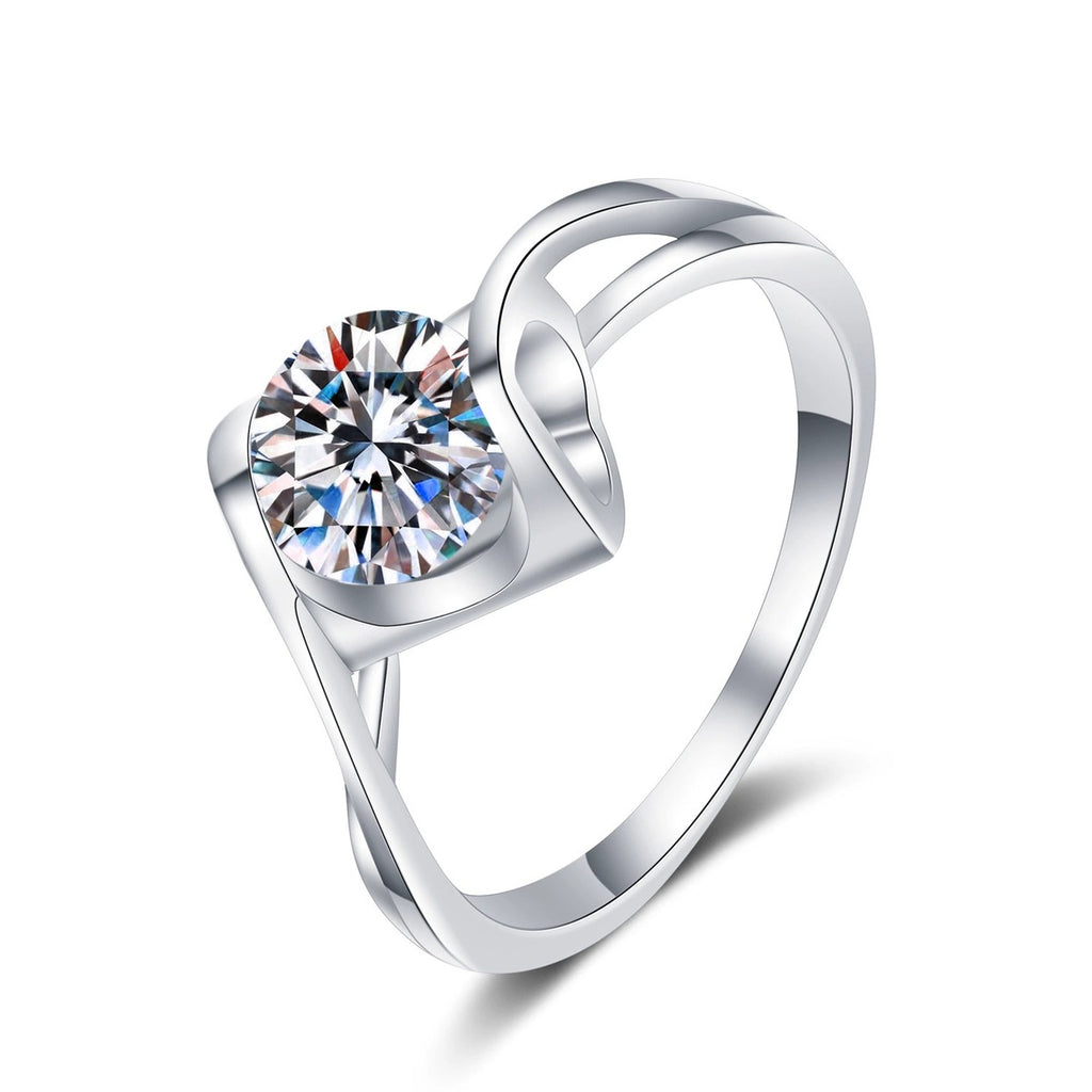 Round Moissanite Twist Ring in rhodium-plated S925 sterling silver on clean white background