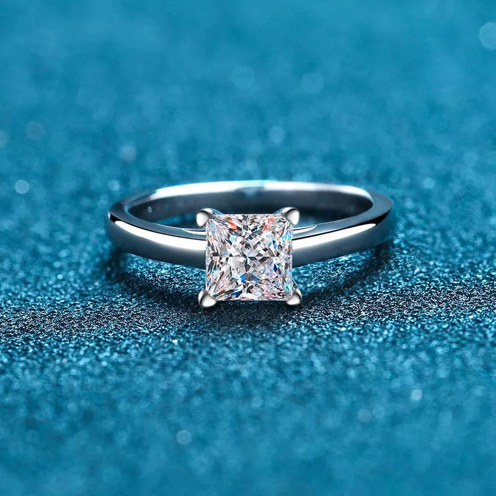 Princess Cut Moissanite Ring in Rhodium-Plated S925 Sterling Silver blue display product photo showing the moissanite setting and band profile