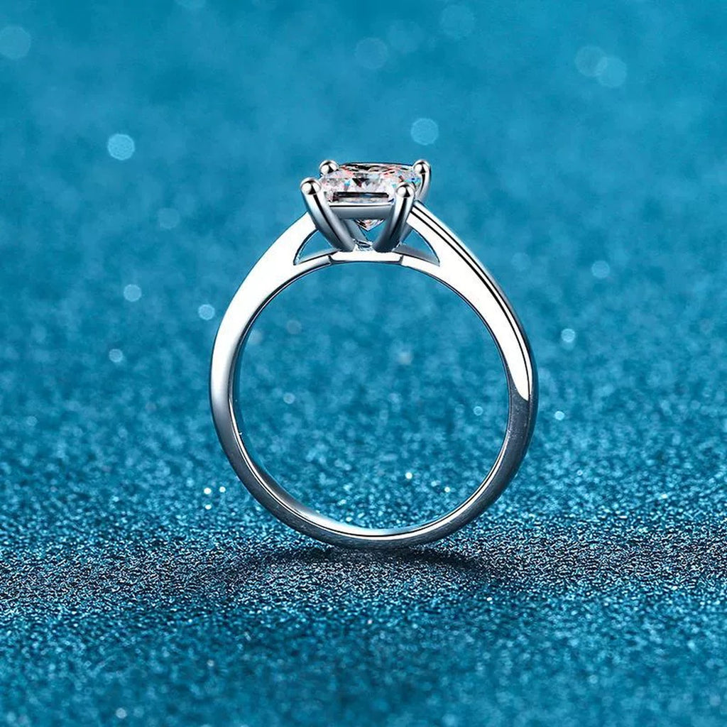 Princess Cut Moissanite Ring in Rhodium-Plated S925 Sterling Silver blue display product photo showing the moissanite setting and band profile