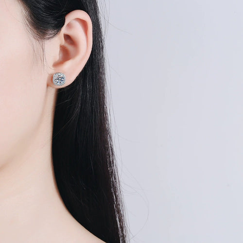 Cushion Halo Moissanite Stud Earrings with CZ in Rhodium-Plated S925 sterling silver worn on ear by model showing scale, placement, and stud earrings styling