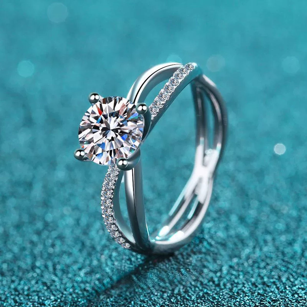 Round Moissanite Side Stone Ring with CZ in Rhodium-Plated S925 Sterling Silver blue display product photo showing the moissanite setting and band profile