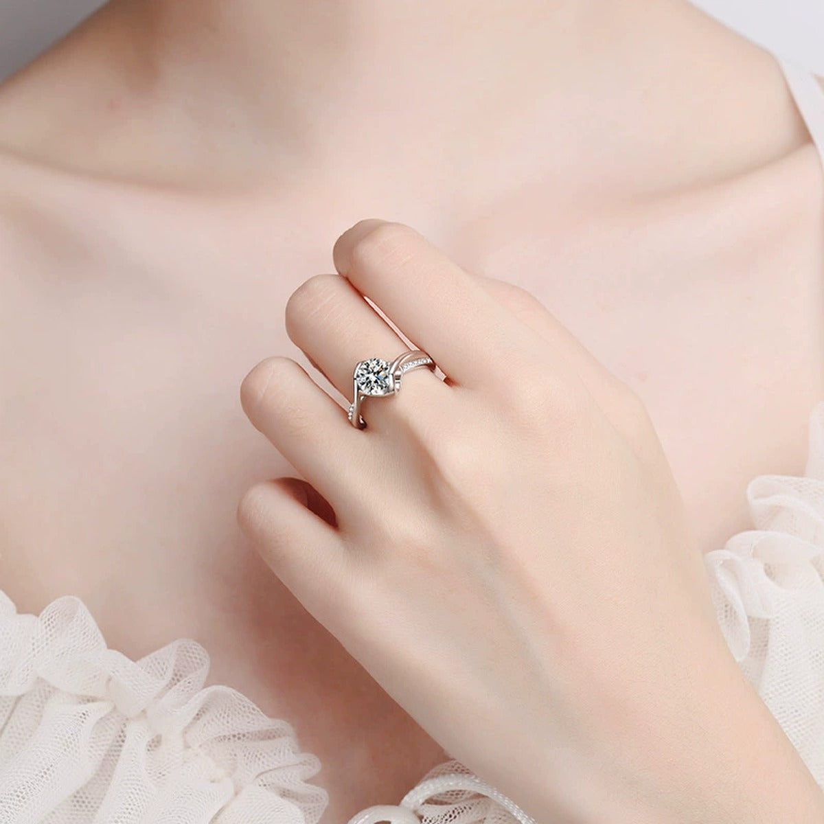 Round Moissanite Side Stone Ring with CZ in Rhodium-Plated S925 Sterling Silver worn on hand, showing scale, finger coverage, and rhodium-plated finish