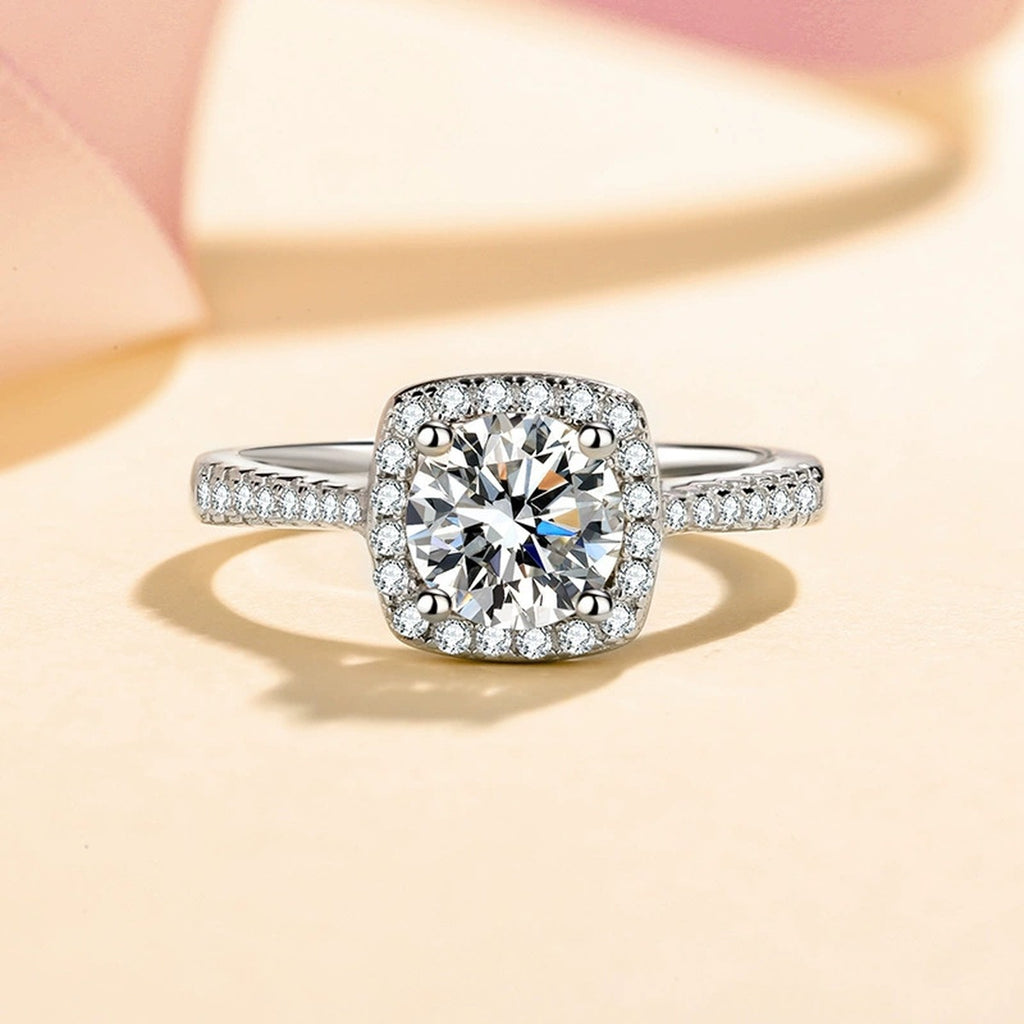 Cushion Halo Moissanite Ring with CZ in Rhodium-Plated S925 Sterling Silver studio product angle showing the ring setting, stone detail, and band design