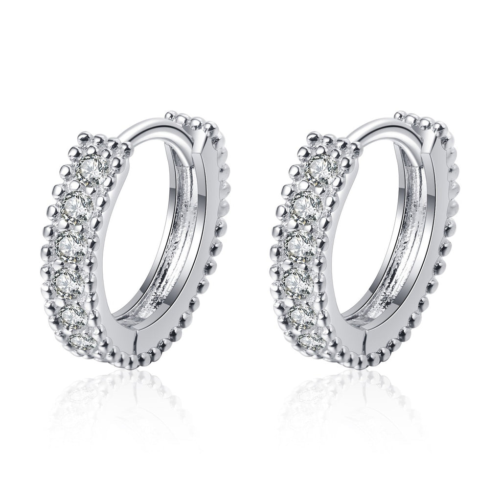 Pavé Moissanite Huggie Hoop Earrings in Rhodium-Plated S925 sterling silver white background product photo showing the pair, stone shape, and huggie hoop earrings silhouette