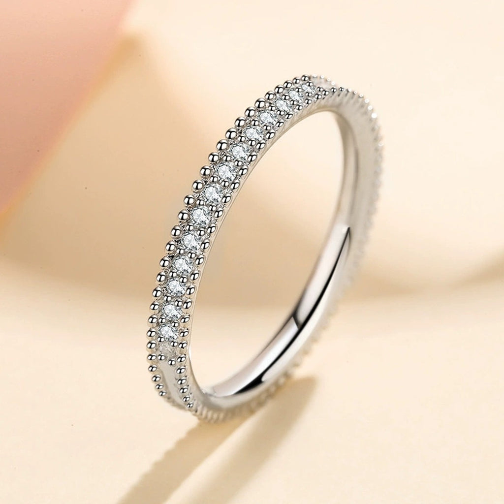 Round Moissanite Ring in Rhodium-Plated S925 Sterling Silver studio product angle showing the ring setting, stone detail, and band design
