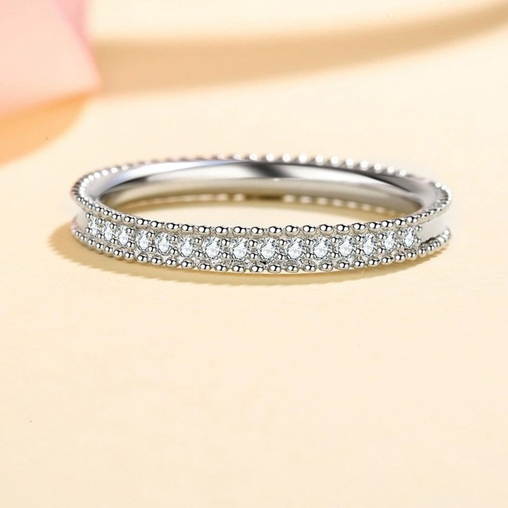Round Moissanite Ring in Rhodium-Plated S925 Sterling Silver studio product angle showing the ring setting, stone detail, and band design