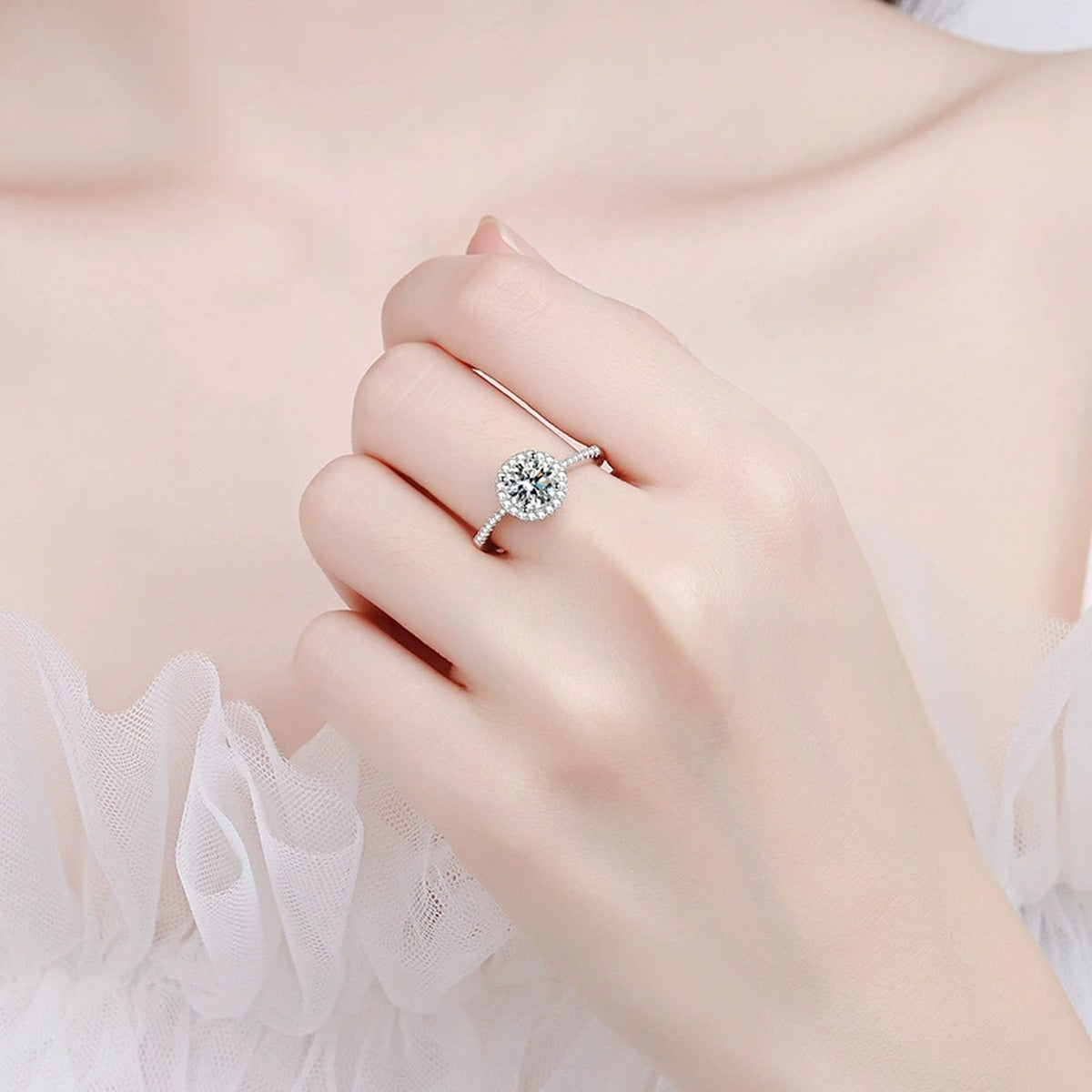 Round Moissanite Side Stone Ring with CZ in Rhodium-Plated S925 Sterling Silver worn on hand, showing scale, finger coverage, and rhodium-plated finish