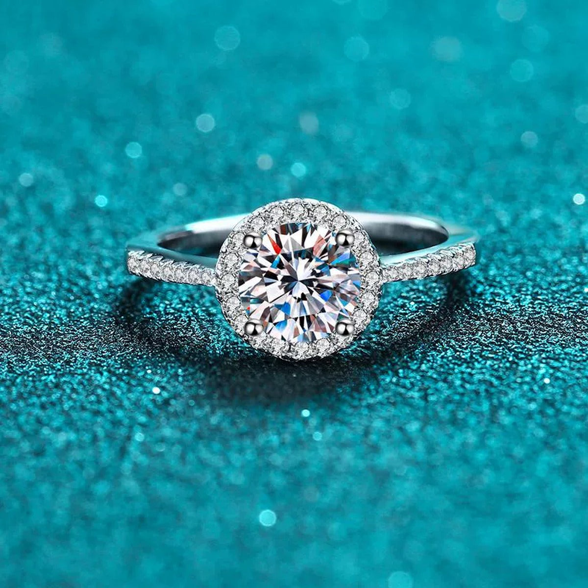 Round Moissanite Side Stone Ring with CZ in Rhodium-Plated S925 Sterling Silver blue display product photo showing the moissanite setting and band profile