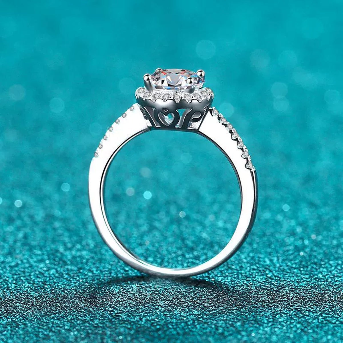 Round Moissanite Side Stone Ring with CZ in Rhodium-Plated S925 Sterling Silver blue display product photo showing the moissanite setting and band profile