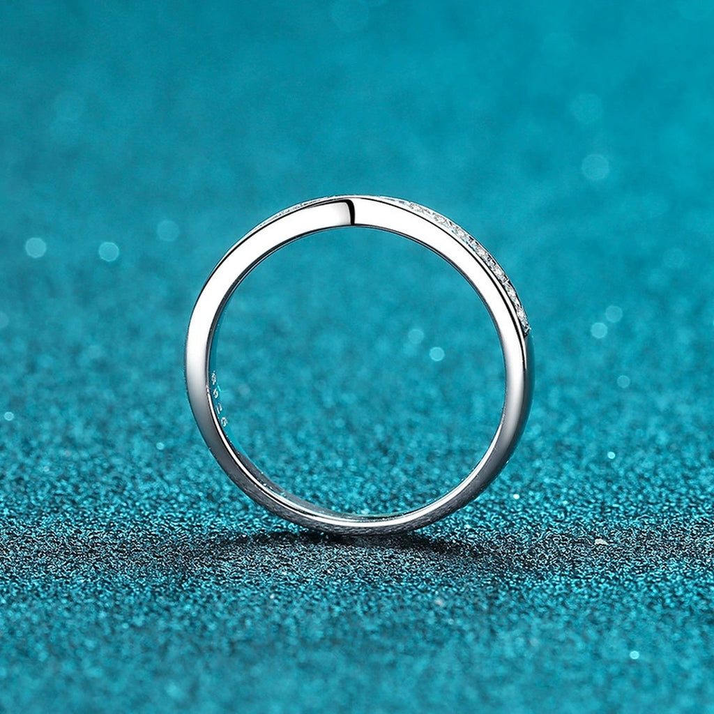Round Moissanite Ring in Rhodium-Plated S925 Sterling Silver blue display product photo showing the moissanite setting and band profile