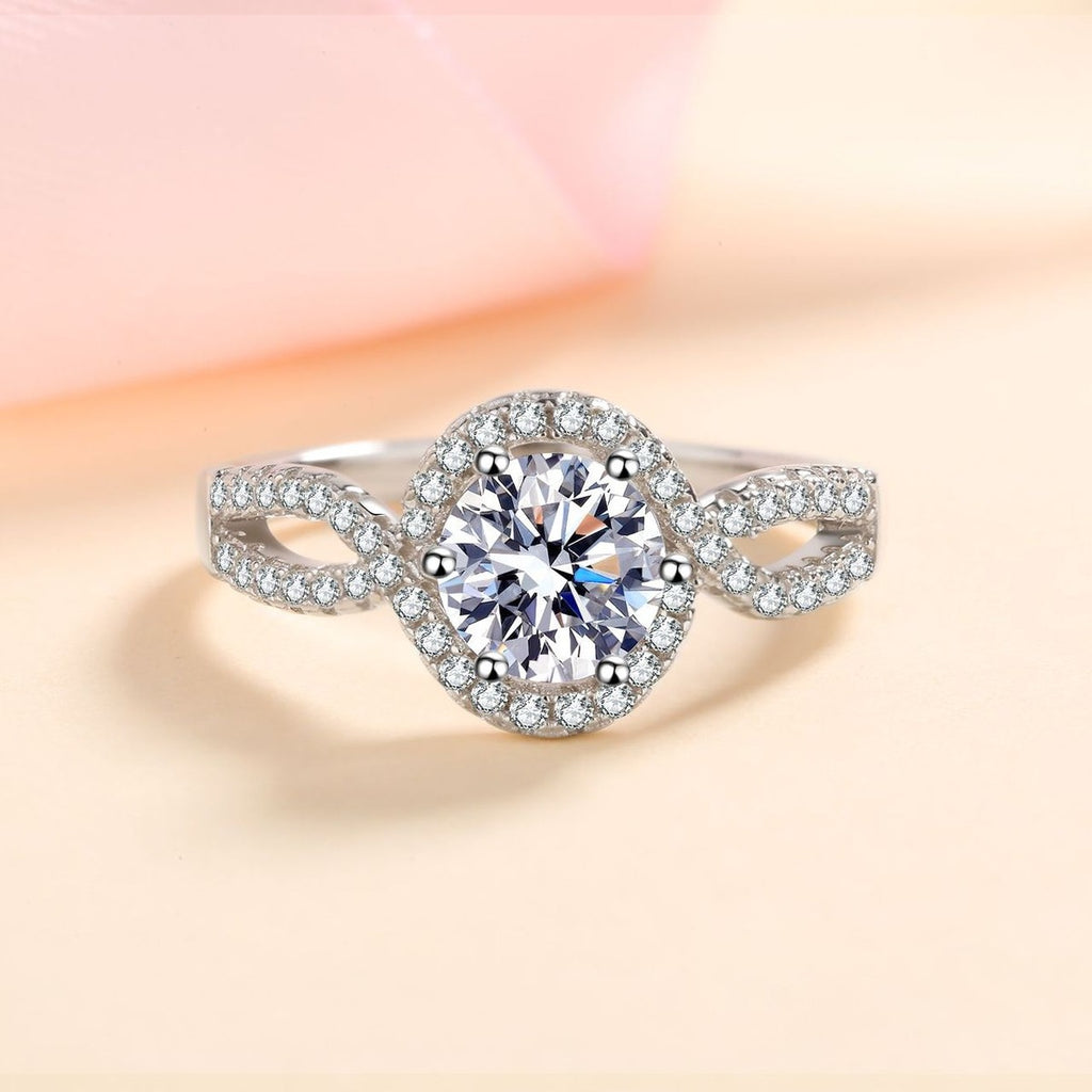 Round Halo Moissanite Twist Ring with CZ product view showing moissanite setting and metal finish