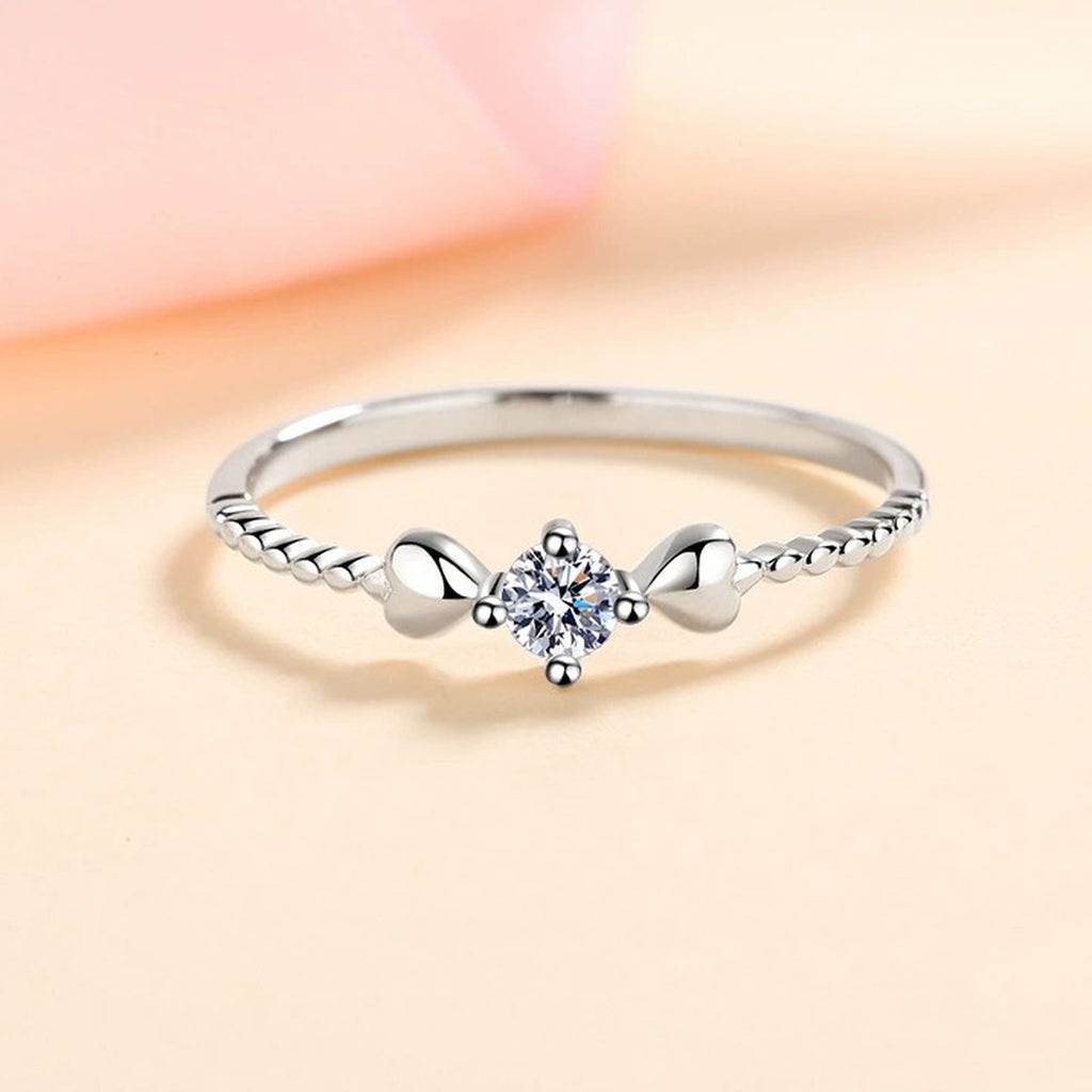 Floral Moissanite Ring in Rhodium-Plated S925 Sterling Silver studio product angle showing the ring setting, stone detail, and band design